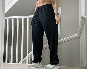 Nike Women's Dri-FIT Mid-Rise leggings in royal - Depop