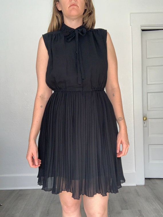 80's flirty little black dress