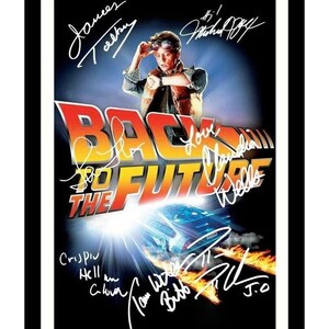 May include: A black and white poster with a blue and yellow "Back to the Future" logo. The poster features a photo of Michael J. Fox as Marty McFly, standing in front of a DeLorean time machine. The poster is signed by the cast and crew, including Michael J. Fox, Christopher Lloyd, Lea Thompson, and Thomas F. Wilson.
