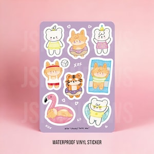 May include: A set of nine waterproof vinyl stickers featuring cute cartoon animals in summery outfits. The animals include a bear, a tiger, and a fox. The stickers are on a purple background with hearts and the text "aria "checky" turns one!" and "WATERPROOF VINYL STICKER".