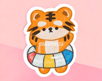 Peut inclure: Un tigre de dessin animé portant un gilet de sauvetage orange et blanc rayé avec des accents bleus et rouges. Le tigre porte un gilet de sauvetage et a une expression joyeuse sur son visage. Le texte "JSRAINBOWS.CA" est visible sur le gilet de sauvetage.