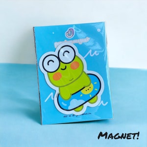 Jellybean the Frog - Goes Swimming - Die Cut Magnet, Waterproof, Decorative Sticker | inflatable donut