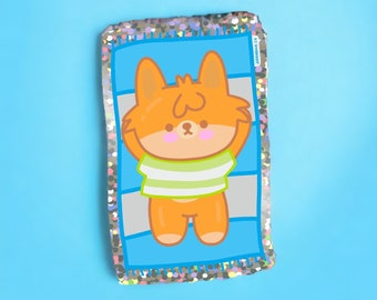 Peut inclure: Autocollant rectangulaire représentant un corgi de dessin animé orange se relaxant sur une serviette de plage à rayures bleues et blanches. Le corgi porte une chemise à rayures vertes et blanches. L'autocollant a une bordure argentée à paillettes et le texte "JERANIMAL CA".
