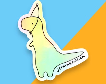 Peut inclure: Un autocollant de dinosaure aux couleurs de l'arc-en-ciel avec un chapeau de fête et le texte "JSRainbows.ca" sur la queue.