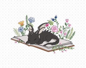 Peut inclure: Un dragon noir avec des ailes dort sur un livre ouvert. Le livre est entouré de fleurs colorées. L'image est un motif de broderie numérique.