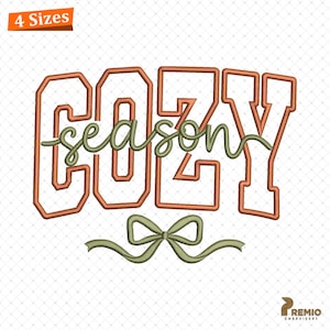 May include: An embroidery design featuring the words "COZY season" in a stylized font, with a bow at the bottom. The text is in shades of brown and green, with the words outlined in a darker brown. The design is labeled "4 Sizes".