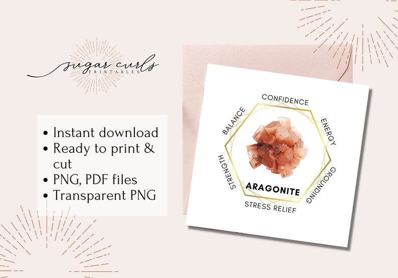 May include: Aragonite crystal with a gold hexagonal frame and text that reads "Aragonite" and "Stress Relief". The frame also has the words "Balance", "Strength", "Confidence", "Energy", and "Grounding" around the crystal.