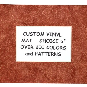 May include: A red textured frame with a white label that reads "CUSTOM VINYL MAT - CHOICE of OVER 200 COLORS and PATTERNS".