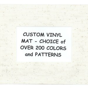 May include: A white textured background with a white frame around a black text box that says "CUSTOM VINYL MAT - CHOICE of OVER 200 COLORS and PATTERNS".