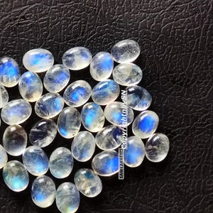 AAA Quality Blue Fire Moonstone Oval 6X4mm Cabochon Loose Flat Back Rainbow Moonstone Oval Gemstone Wholesale 6X4mm Moonstone Cabs 5-25Pcs