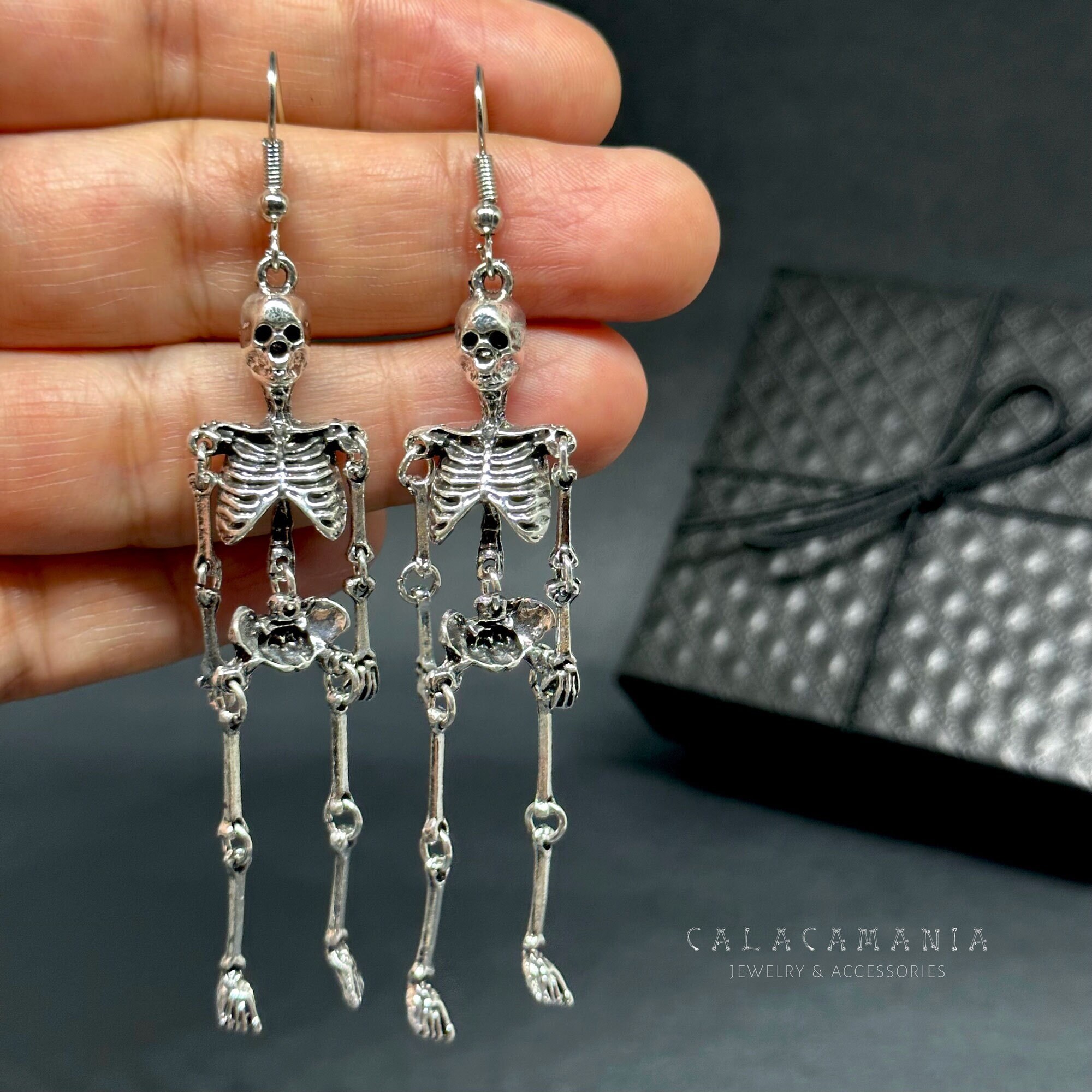 Dangle store skeleton earrings