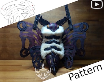 May include: A purple and black leather butterfly-shaped bag with a white fur body and a black leather strap. The bag has a pattern of cutouts and is hanging from a hook. The word "Pattern" is written in white on a black background in the lower right corner of the image.