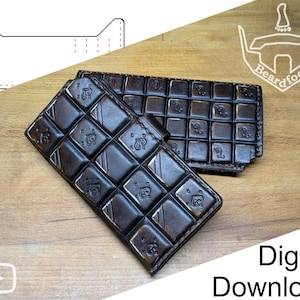 May include: Two dark brown leather wallets with a raised grid pattern resembling a chocolate bar. Each square features a small embossed spade symbol. A white line drawing of a pattern template and the text Beardfoot are visible.