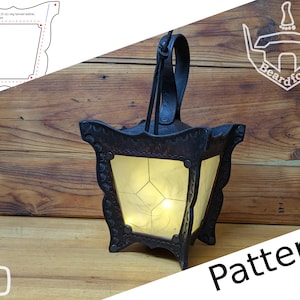 May include: A dark brown leather lantern with a top handle and four translucent white panels featuring a diamond grid pattern. The lantern is illuminated from within. A diagram labeled Side Wall and the text Beardfoot Pattern are visible.