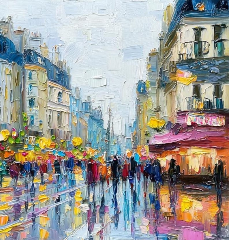 May include: Impressionistic oil painting of a European city street scene. Buildings with blue roofs and cream-colored facades line the street. People are walking on a wet street, reflecting the lights and colors of the buildings.
