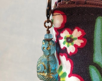 Oasis, a cat charm for a bag, journal or zipper.