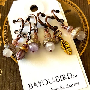Fable Oak, a set of six removable stitch markers for knitting and crochet.