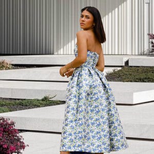Strapless corset party gown,
Floral jacquard cocktail dress with pockets,