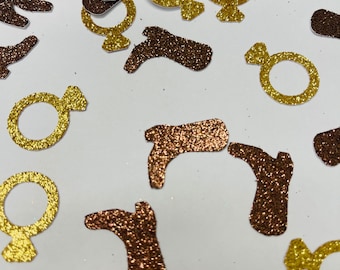 May include: Gold and brown glitter confetti with images of rings and boots. The confetti is perfect for a wedding or bridal shower.