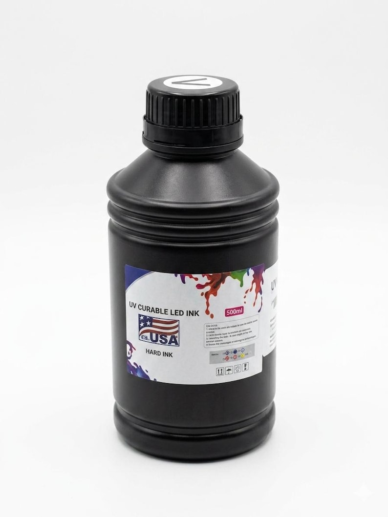 May include: A black plastic bottle containing 500ml of UV curable LED hard ink. The label features a graphic of colorful paint splashes, an American flag icon, and the text "UV CURABLE LED INK" and "HARD INK" with usage instructions.