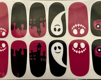 May include: Sheet of Halloween-themed nail art stickers. Designs include ghosts, jack-o'-lanterns, haunted houses, and dripping blood effects. The stickers feature black, white, and burgundy colors. The stickers are oval-shaped.