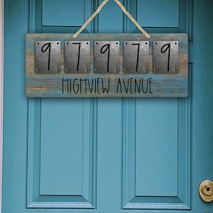 May include: A rustic wooden sign with metal number plates reading "97979" and the text "HIGHVIEW AVENUE".