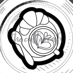 May include: Black and white line art illustration of a cafe breakfast. A cup of coffee with a heart design, a croissant, and a spoon are on a plate. The words "cafe breakfast" are at the bottom.