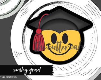 May include: A yellow smiley face wearing a black graduation cap with a red tassel. The text "smiley grad" is below the image.