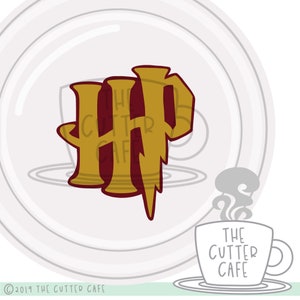May include: A gold and maroon HP logo with a lightning bolt, on a white background with a gray circle and a gray coffee cup with the text "The Cutter Cafe" in black.