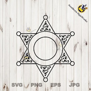 May include: Black and white outline of a sheriff's star with a circle in the center. The star has decorative flourishes around the circle. The image is on a woodgrain background.