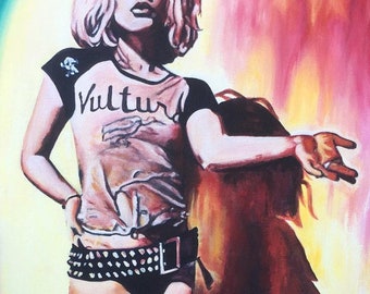 May include: Painting of a person in a Vulture t-shirt, black shorts with studded belt, and black heels. The background is a blend of pink, yellow, and orange hues, with a large shadow.