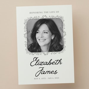 Puede incluir: Una tarjeta conmemorativa con un retrato en blanco y negro de una mujer, enmarcado por un borde floral. La tarjeta dice "Honrando la vida de Elizabeth James" con fechas de nacimiento y defunción.