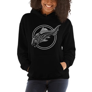 May include: Black hoodie featuring a white graphic of a stylised fish with a circle around it.