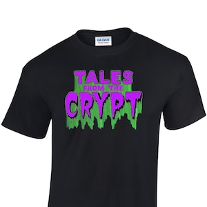 May include: Black t-shirt with a green and purple graphic that says "Tales from the Crypt".