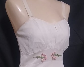 Vintage white sleeveless gown with appliques
