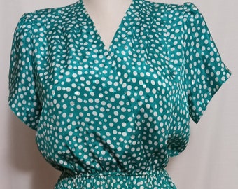 Vintage green dress with white polka dots