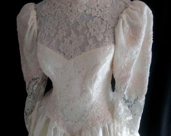Vintage white wedding gown with pink beads