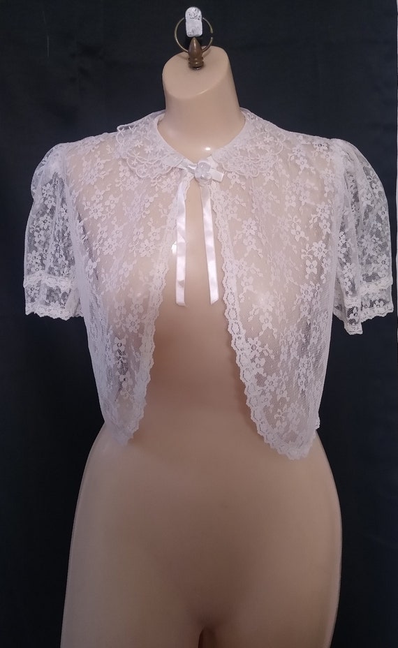 Vintage white lace cropped wedding jacket