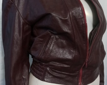 Vintage burgundy leather bomber jacket