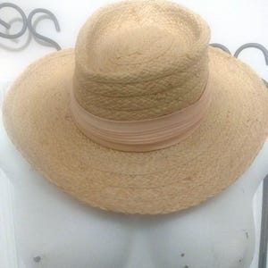 Vintage tan straw hat with pink band