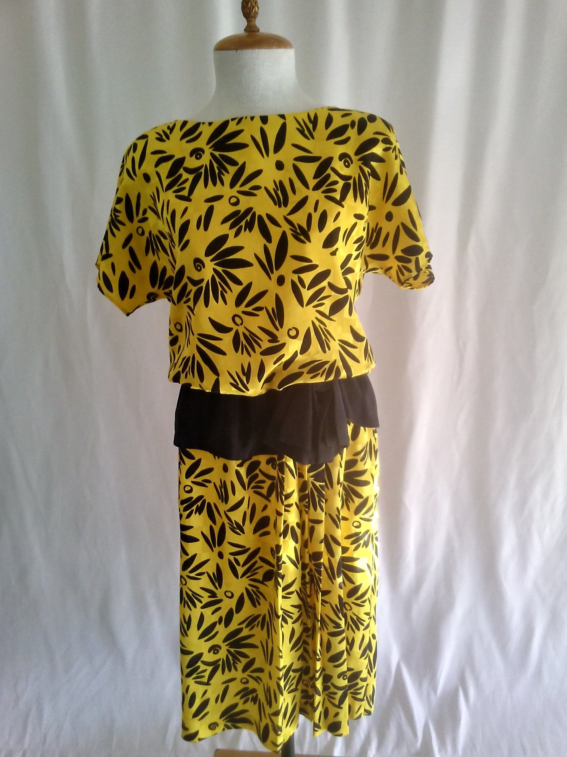 Vintage yellow peplum style dress