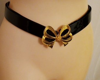 Vintage black and gold bow belt