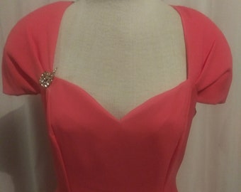 Vintage pink gown with brooch