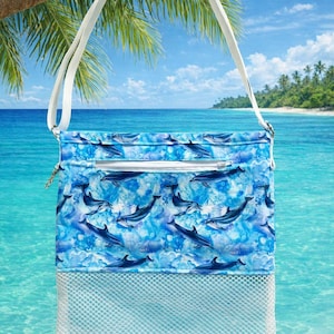 May include: A white ceramic mug with a black handle and the text "But First, Coffee" in a bold, black font. The mug is set against a blurred background, suggesting a cozy setting.