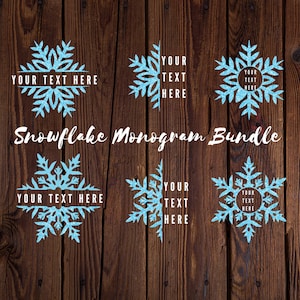 May include: A collection of six light blue snowflake designs with text areas, set against a dark brown wood grain background. The text areas read "YOUR TEXT HERE". The words "Snowflake Monogram Bundle" are in white script.
