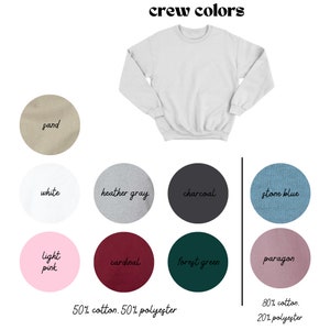 May include: A chart showing different crewneck sweatshirt colors with their corresponding fabric composition. The colors include sand, white, heather gray, charcoal, stone blue, light pink, cardinal, forest green, and paragon. The fabric composition is 50% cotton and 50% polyester for most colors, except for paragon, which is 80% cotton and 20% polyester.