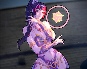 May include: A sticker featuring a fantasy character with dark hair and purple and gold attire. The character has pale skin and red eyes. A pink circle with a yellow die is to the right of the character.