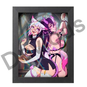 May include: Framed artwork featuring two anime-style figures. One figure wears a nun's habit with cat ears and glasses, holding a book. The other figure has devil horns and a revealing outfit. The artwork is set against a blurred background.
