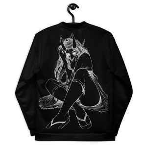 May include: Black bomber jacket featuring a white illustration of a horned figure with long hair, seated with hands near the face. The artwork is detailed, with the figure wearing what appears to be a kimono and sandals. The jacket is hanging on a black hanger.