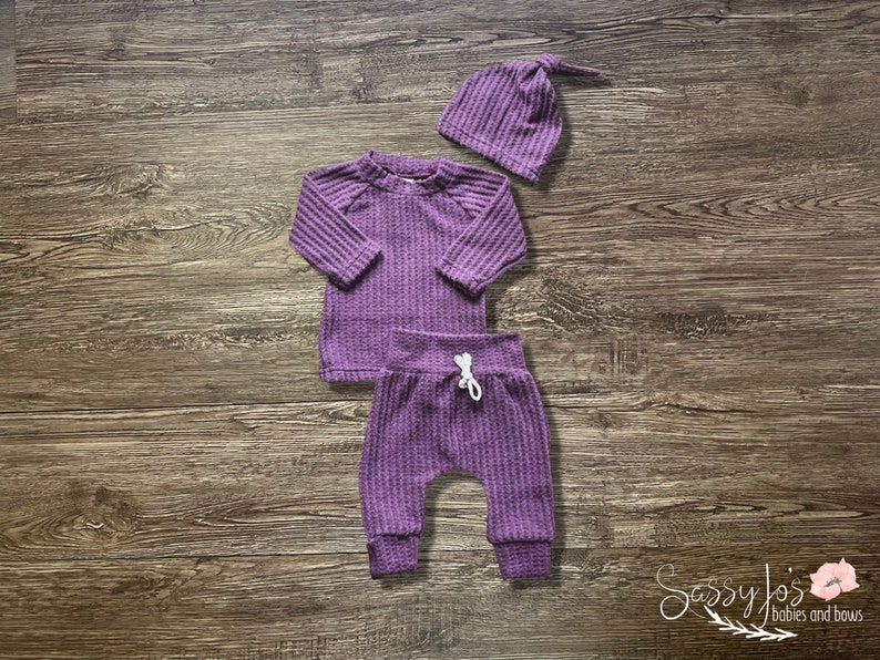 Newborn baby girl purple waffle knit going home outfit with matching hat. Sassy Jo's Babies and Bows